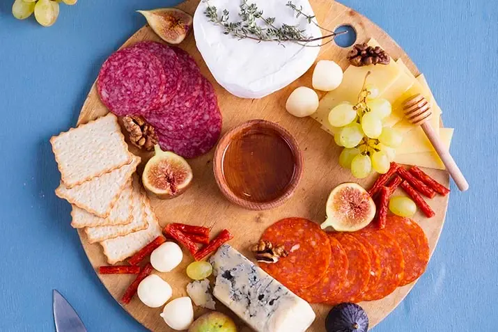 The Art Of Grazing: Exploring The Charcuterie Board Trend