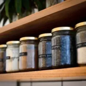 labeled jars on shelf