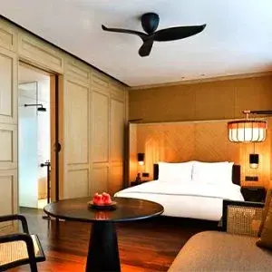 The RuMa Hotel and Residences room with a ceiling fan