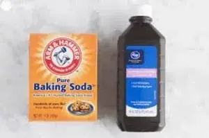 box of baking soda next to hydrogen peroxide