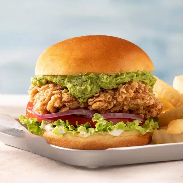 Fried Chicken Sandwich with Dill Pickle Avocado and Fries