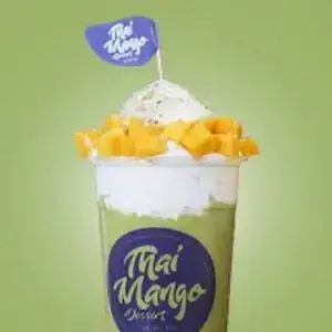 Thai mango drink with mango on top