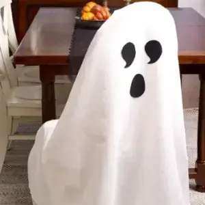 white chair cover with ghost face