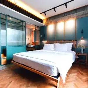 KLoe hotel room with wall lighting